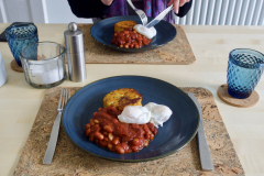 Roast carrot and potato cake, beans and eggs