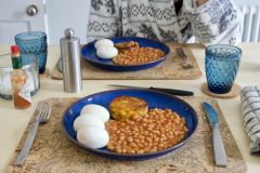 Egg and beans with roast carrot potato cake